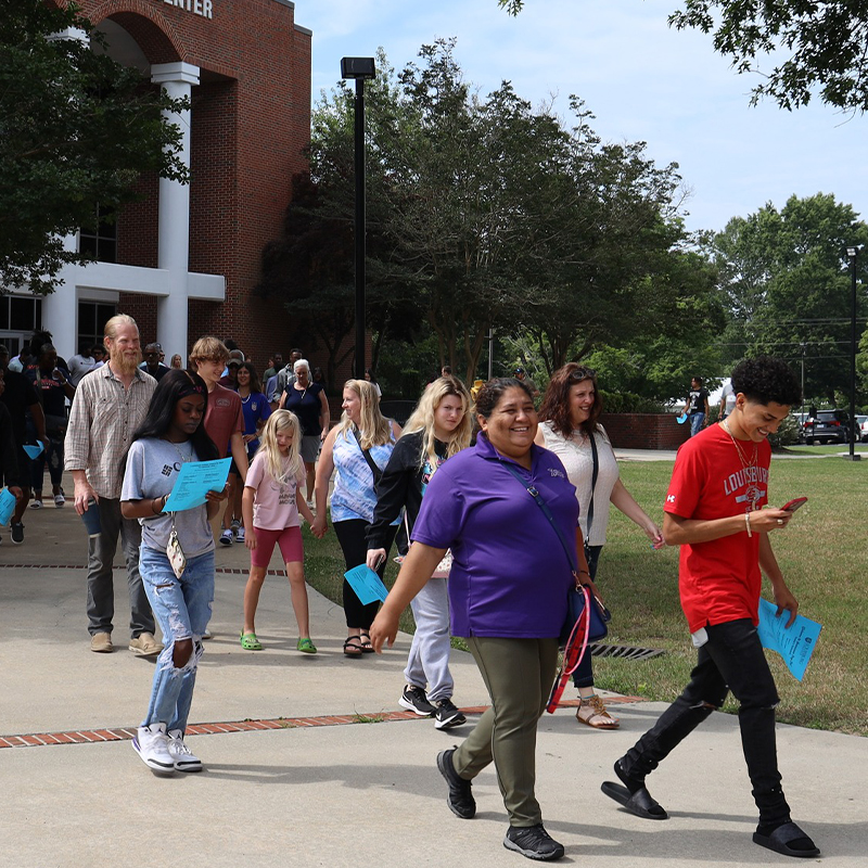 New students walking on campus.